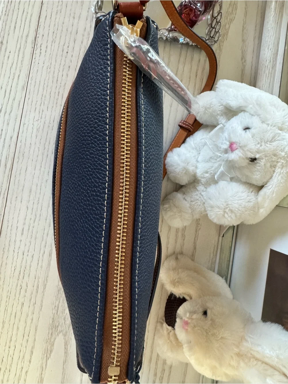 Dooney & Bourke Navy Pebble Leather Crossbody with Brown Trim and Gold Hardware